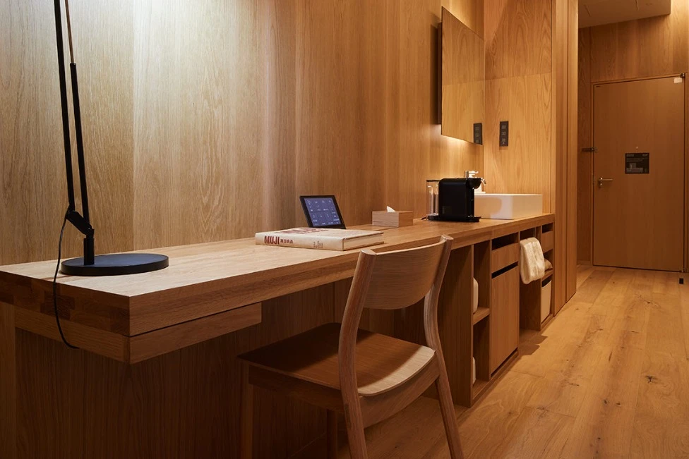 Wall desk and amentities are features in the Type C room