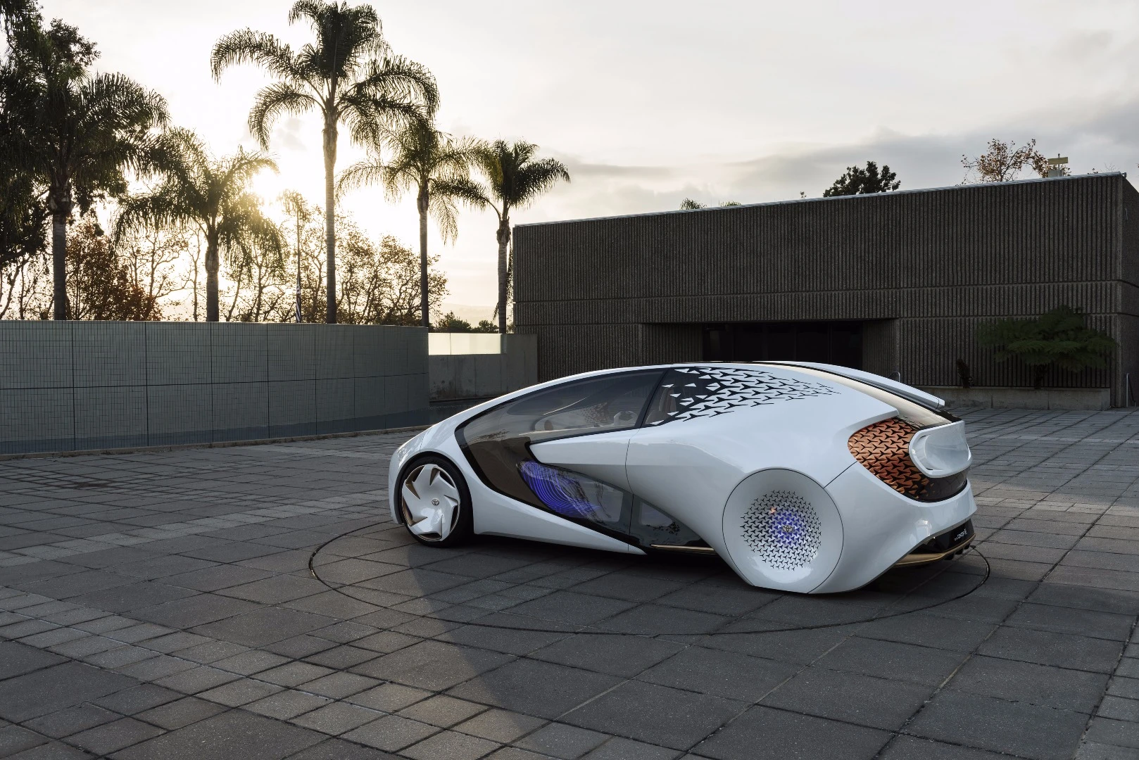 The Toyota Concept-i employs a highly conceptual, futuristic look with lots of glass and faired rear wheels