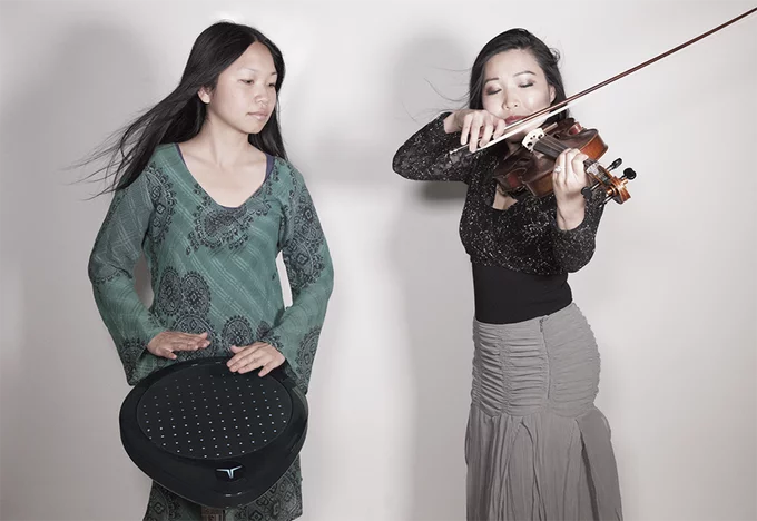 Real world meets digital as a violin player gets some sonic assistance from the Pulse