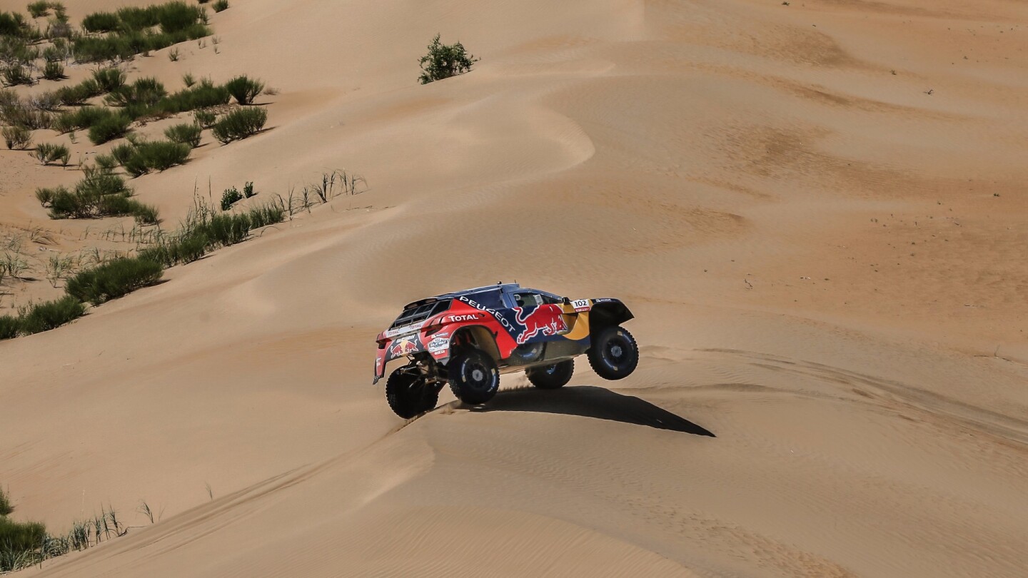 Sebastien Loeb says the new Peugeot 3008DKR Maxi "has less of a tendency to roll on its suspension now, so that gives you more confidence to attack and get it sideways."