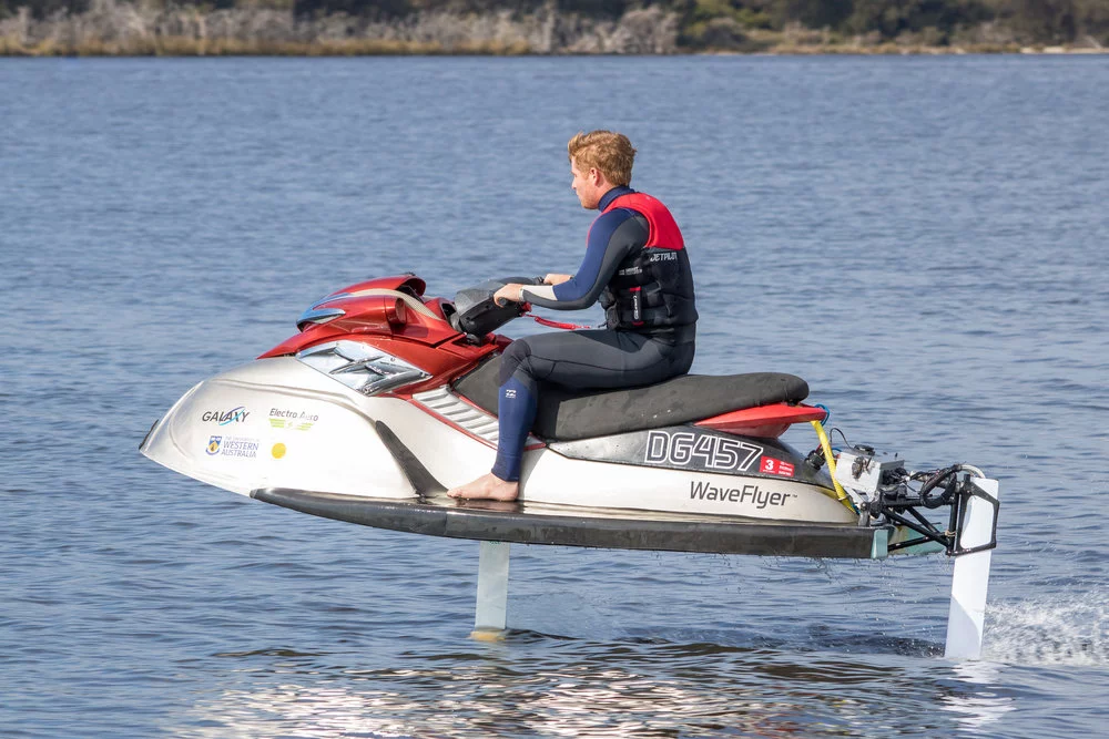 The WaveFlyer rises above the waves courtesy of the patent-pending WaveDrive stabilized twin hydrofoil propulsion system
