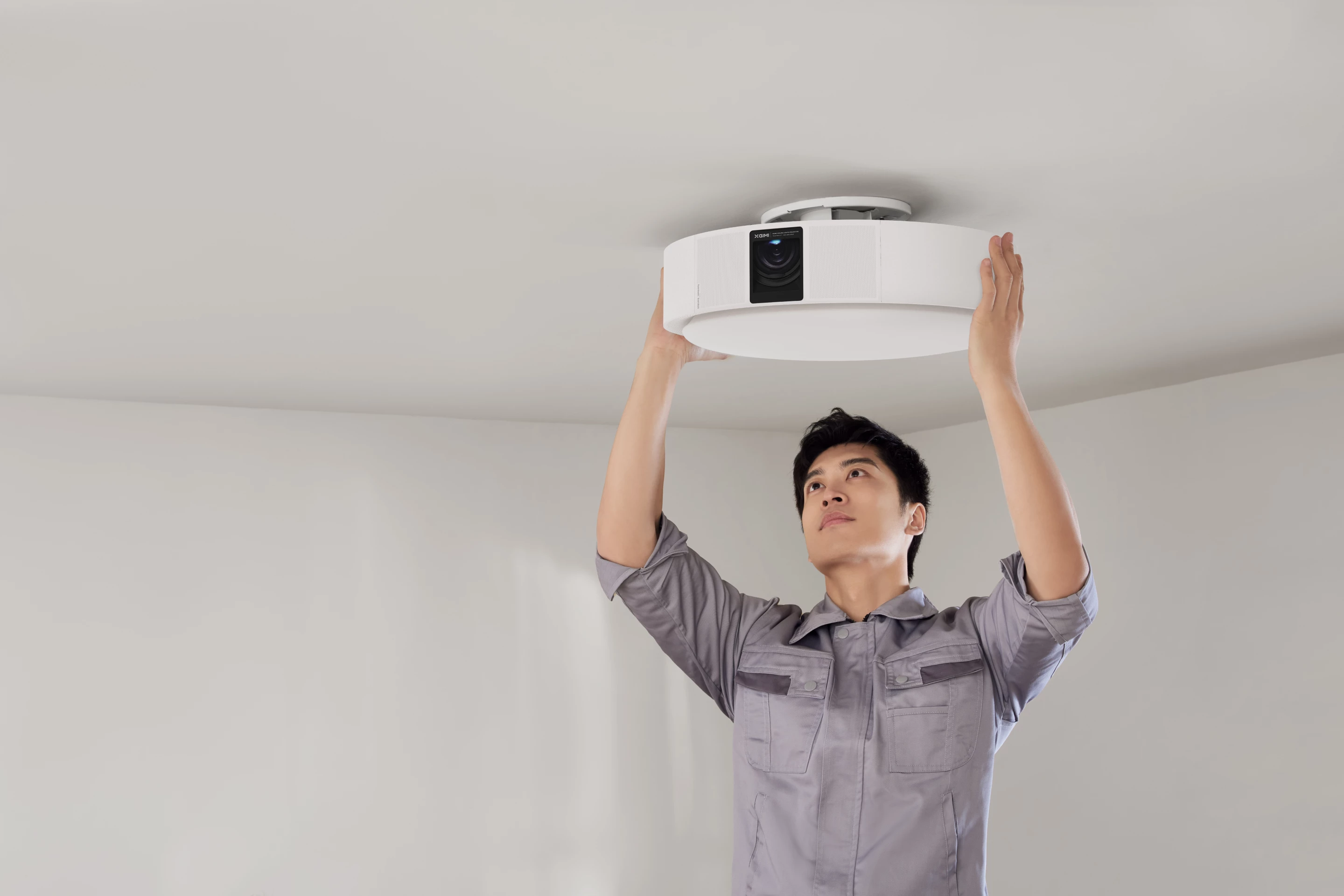 The Magic Lamp is mounted to the ceiling and serves as a smart projector, room light and wireless speaker
