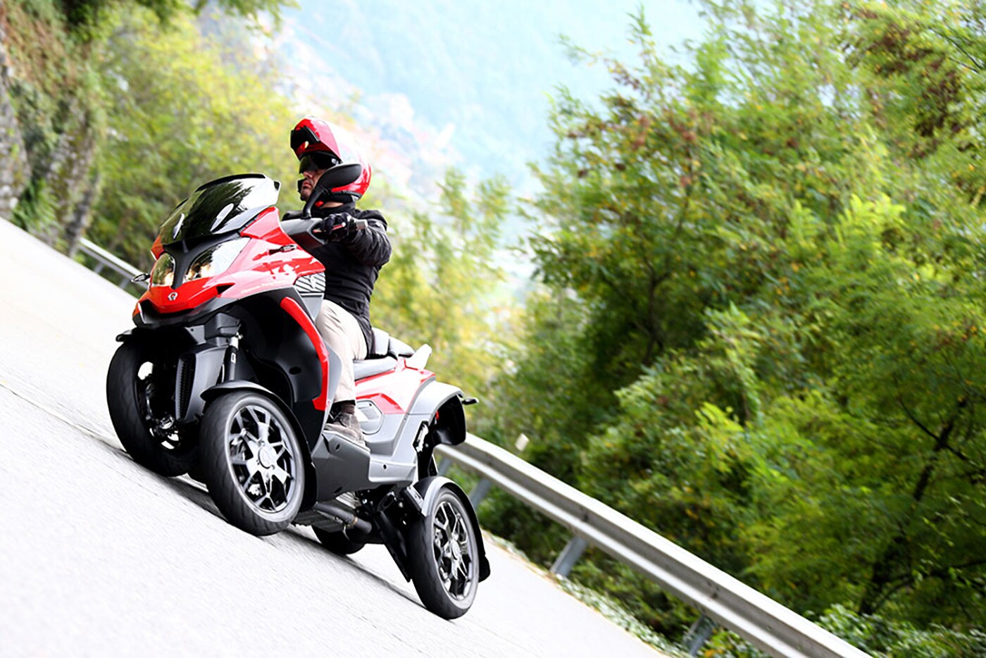 The four-wheeled Quadro was designed by the same person who designed the Piaggio MP3 and the Yamaha Tesseract