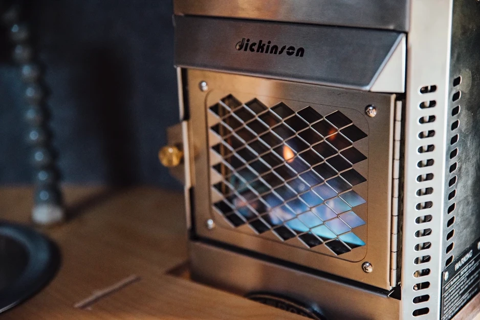 The available Dickinson propane fireplace includes a chimney built into the Kimbo camper