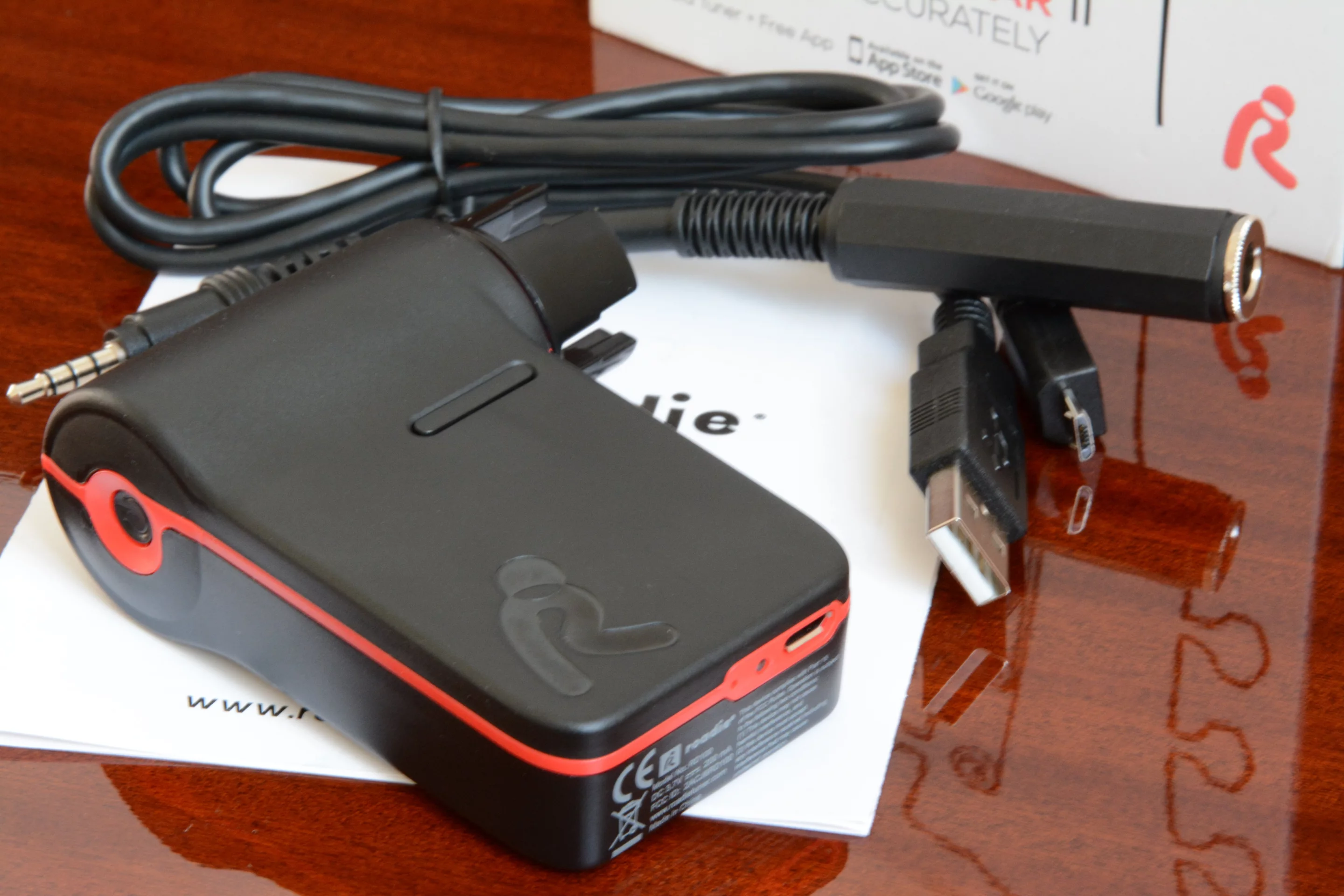 Roadie is supplied with a USB charging cable, an adapter with a 3.5 mm jack at one end and a 6.4 mm instrument input at the other, and a user manual (Photo: Paul Ridden/Gizmag)