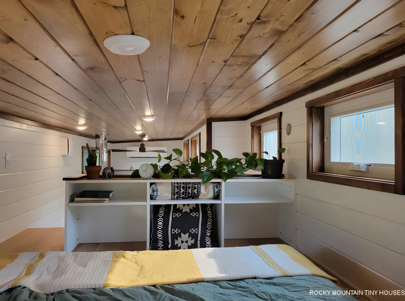 The Bandelier's bedroom features a storage unit that adds a little privacy too
