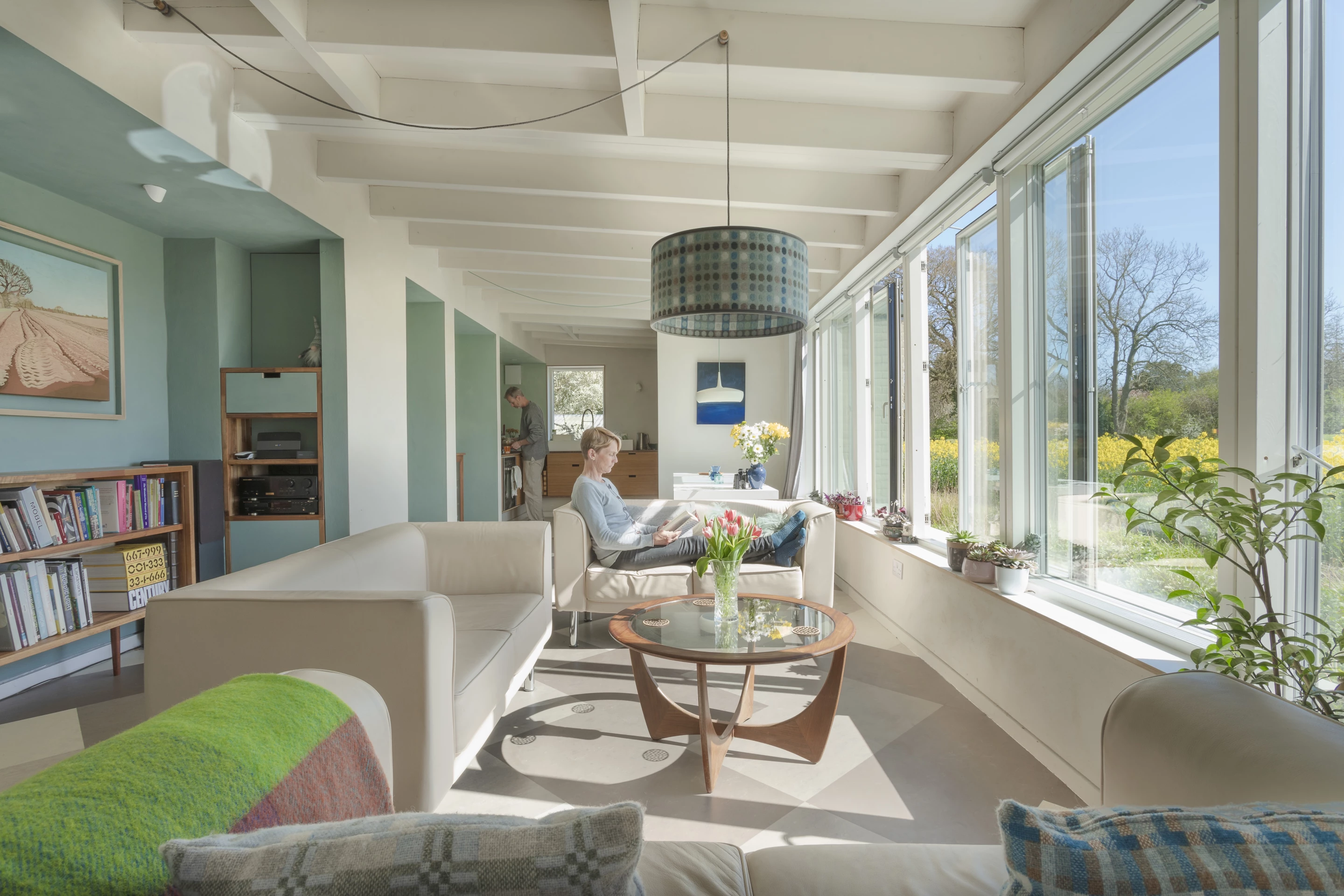 Suffolk Cottage was designed by Haysom Ward Miller Architects and is located in Bury St Edmunds. It turned an old-fashioned four-room laborer's cottage into a new family home