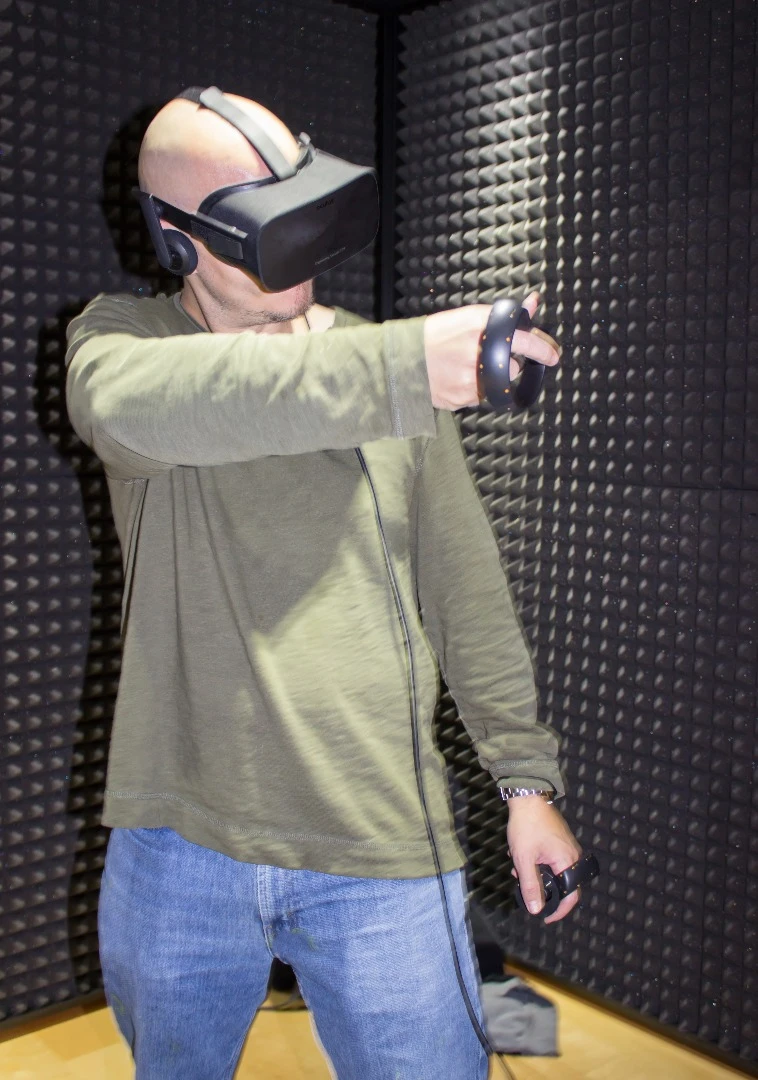 Picking off targets with a virtual six-shooter, using the Oculus Touch controls