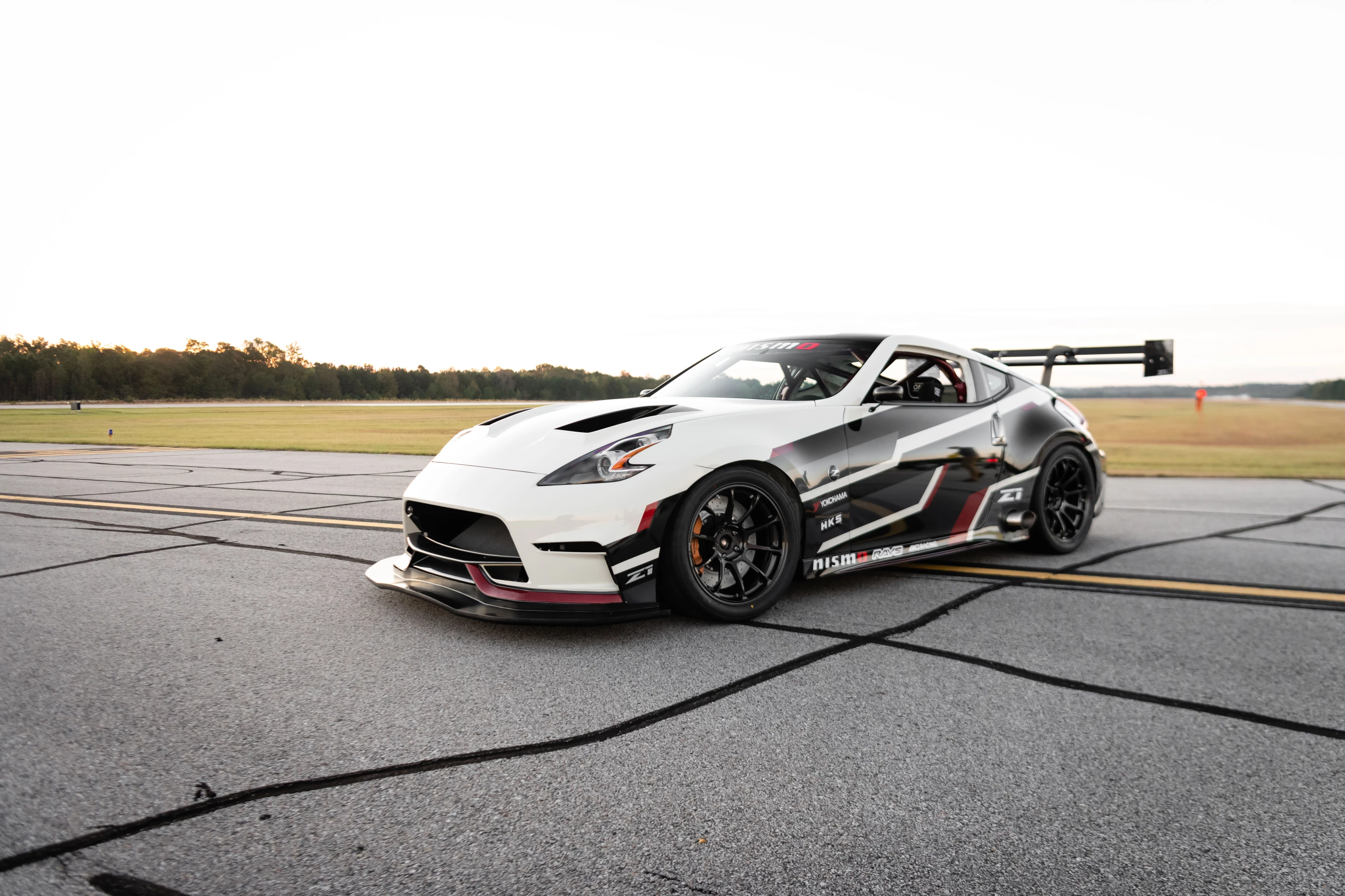 The Nissan 3.7-liter V6 was revamped, adding Garrett GTX 3076 turbochargers, fuel management changes, and a Z1 Motorsports exhaust