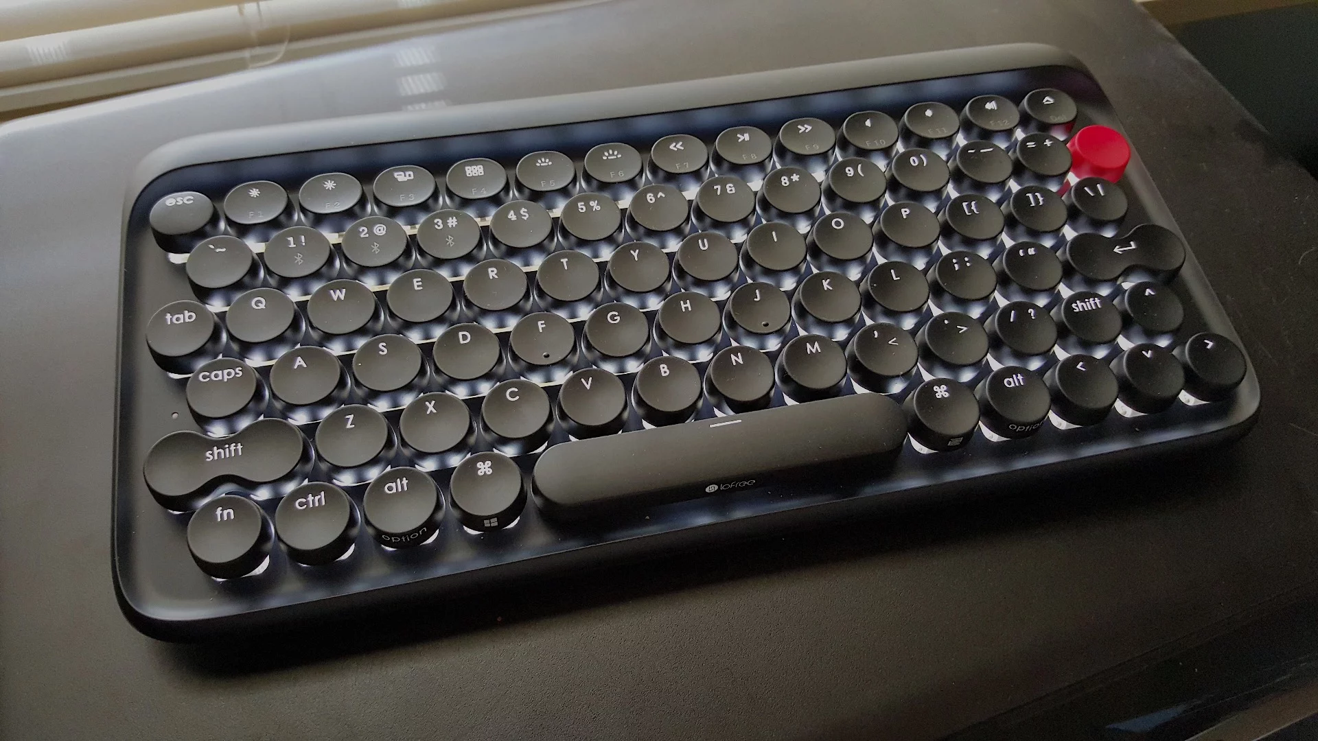 The Lofree keyboard with its backlight turned on
