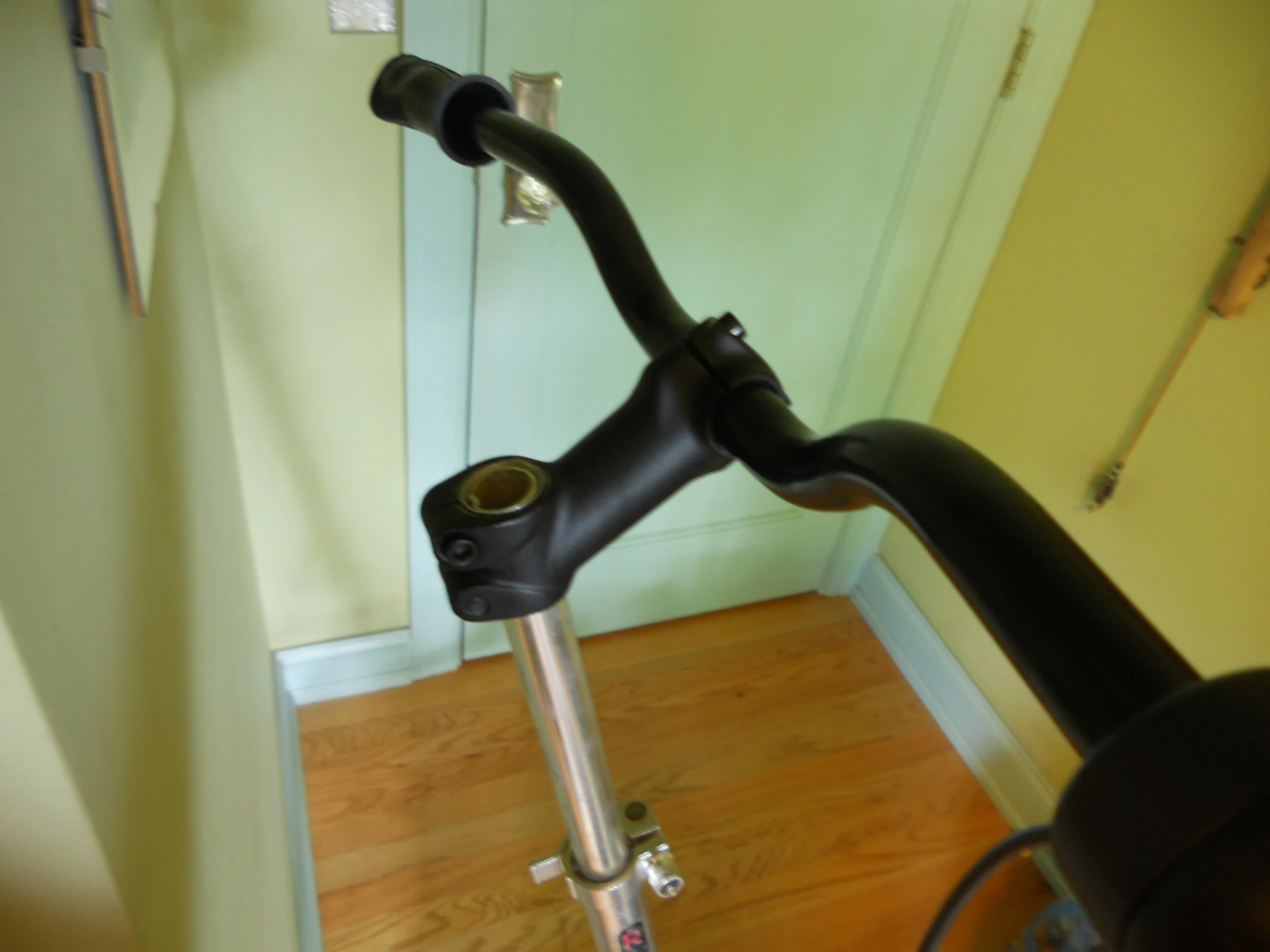 The new handlebars came from a mountain bike and were fitted with a hall effect twist grip throttle