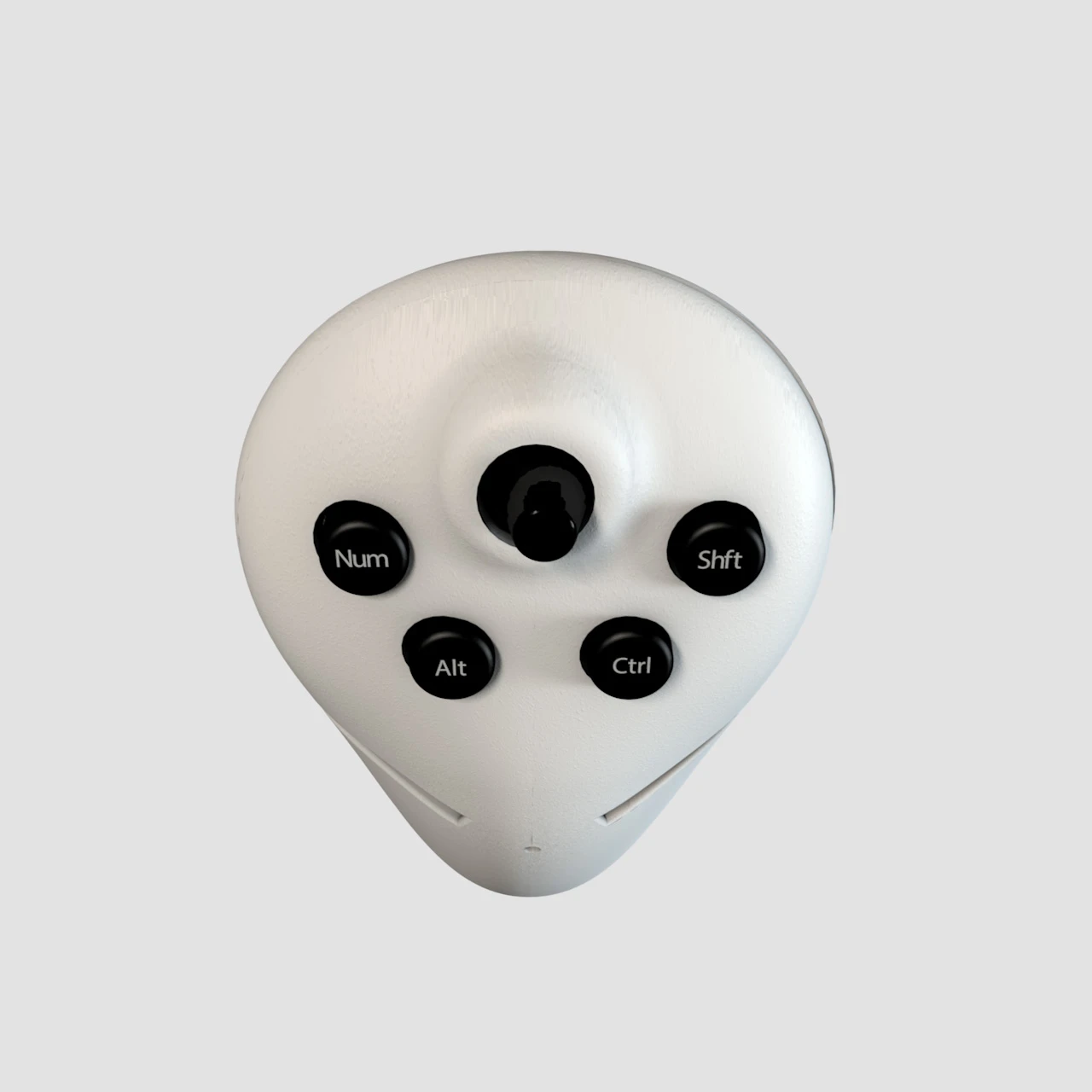 The top side of the Twiddler3 is manipulated using the thumb and includes special keys like shift and control