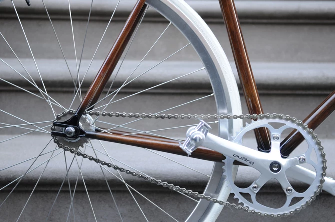 New Zealand's Rob Pollock hand-paints clients' bicycle frames with a faux woodgrain finish