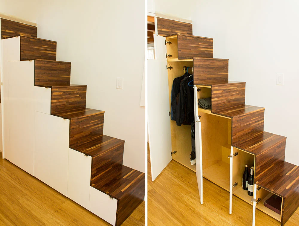 A bespoke staircase which boasts lots of hidden storage space leads to the main loft