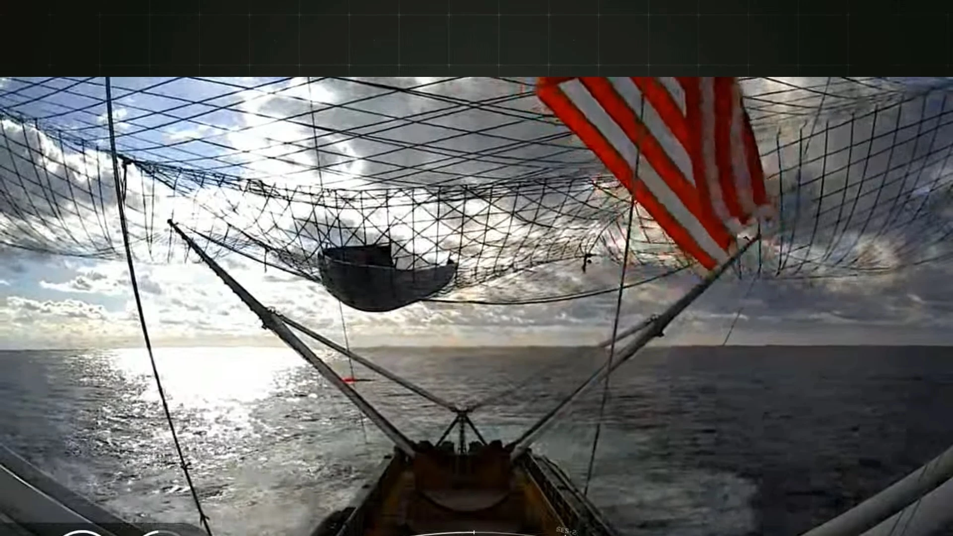 A screen grab showing a rocket fairing recovered by a SpaceX ship during an earlier mission