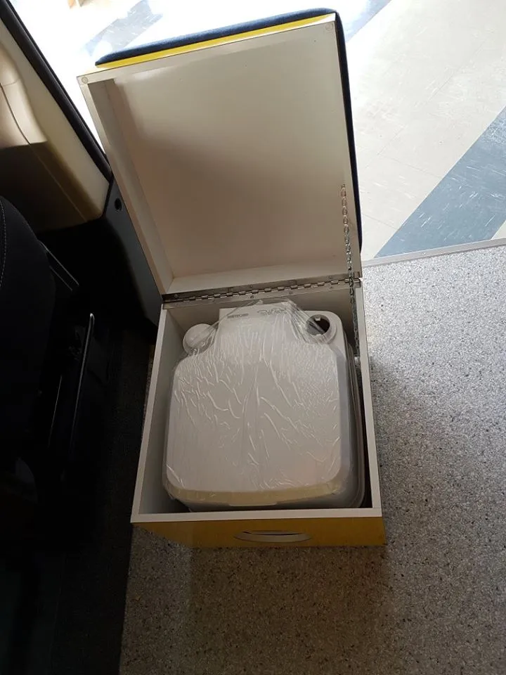 Imagine toilet compartment/footrest