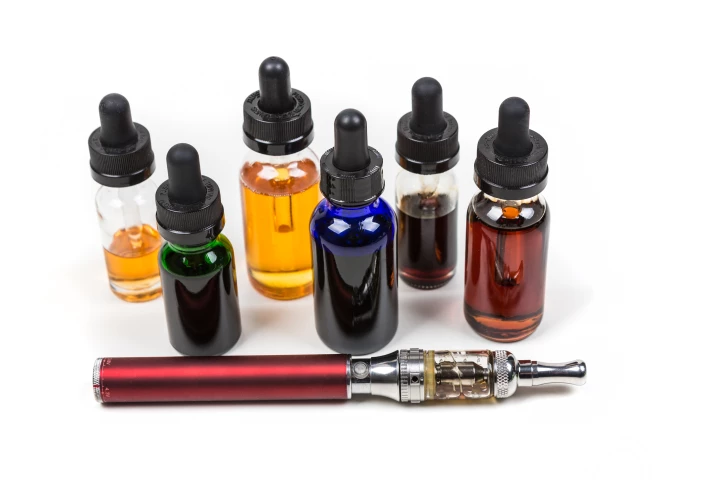 A Trump administration announcement tasks the FDA with enforcing guidelines that restrict the sale of unapproved flavored e-cigarettes, effectively banning the products in the United States