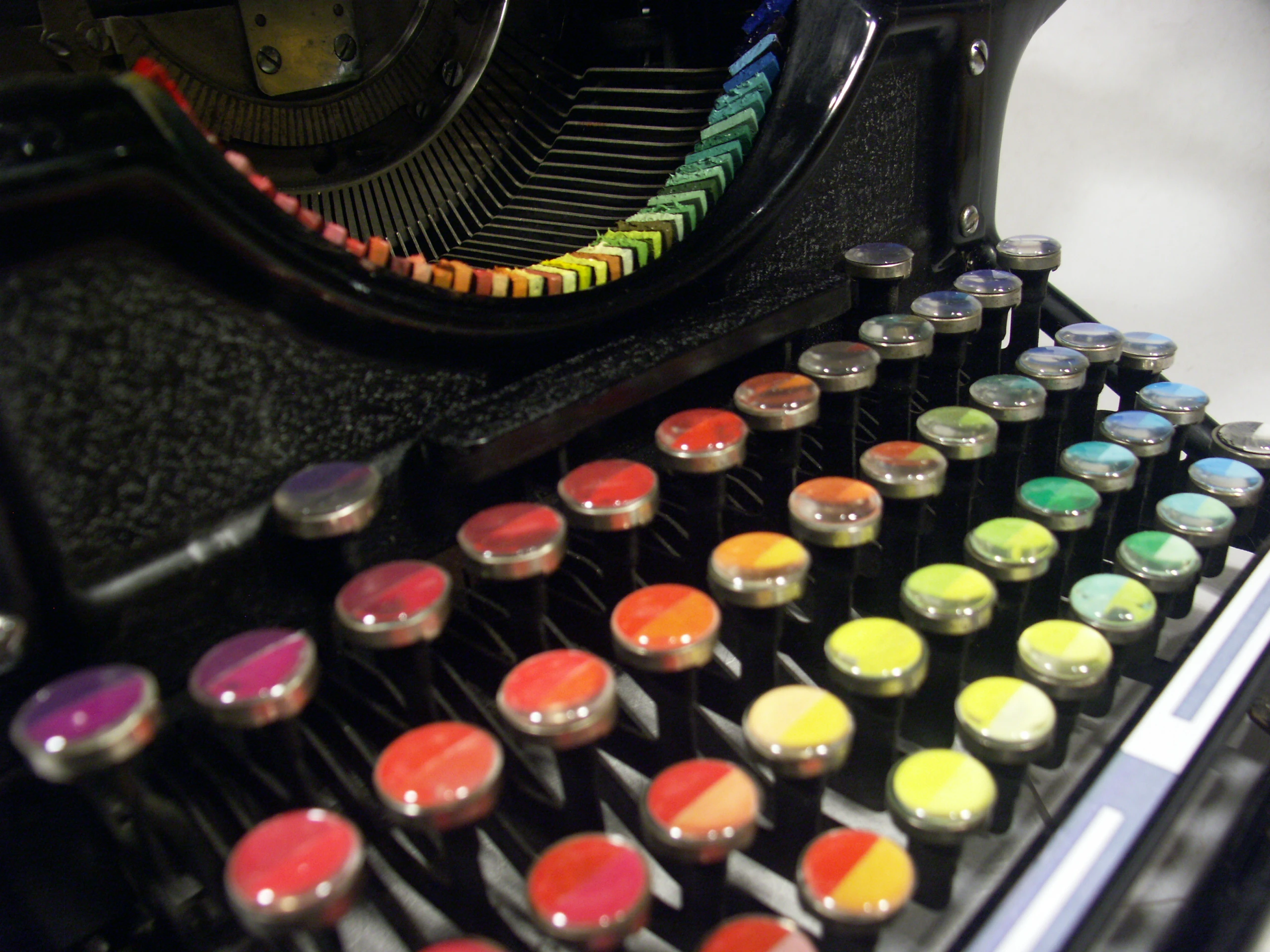Each key on the typewriter's keyboard corresponds to a different hue