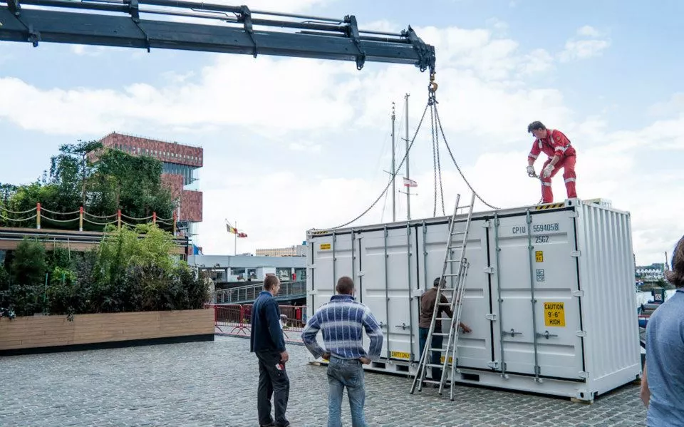 Since it takes up much less space, the various rooms could be set down outside a concert, in a park, or even on a bustling city street, all in a matter of hours