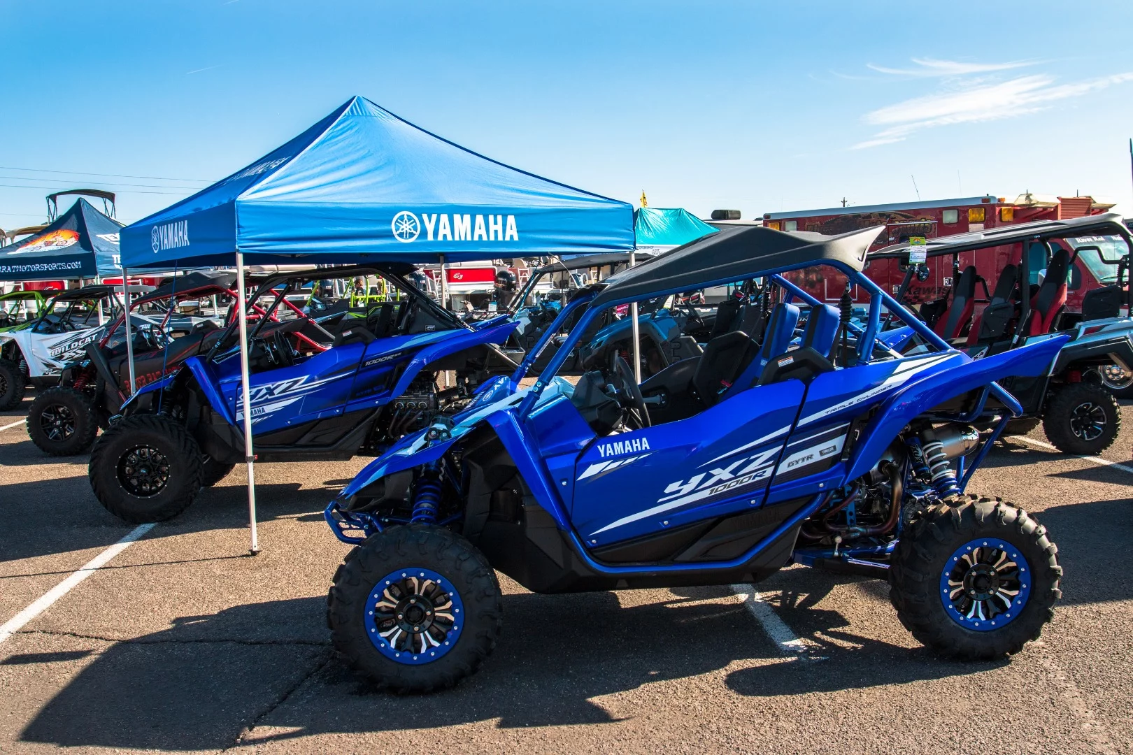 Yamaha's 2019 YXZ 1000R and YXZ 1000R SS, made for the side-by-side driver who wants a more visceral driving experience. For 2019, Yamaha's lowered the transmissions gear ratio by 24 percent, while the new, bigger wheel and tire size results in the final drive gear ratio being lowered by 16 percent, making slower speeds and more technical trails easier