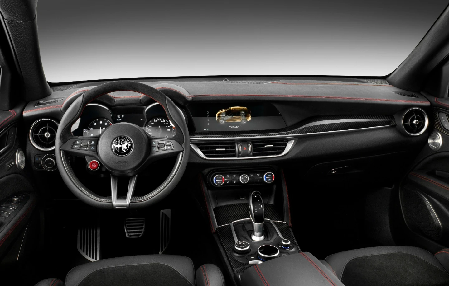 The Stelvio is the same as the Giulia from behind the wheel