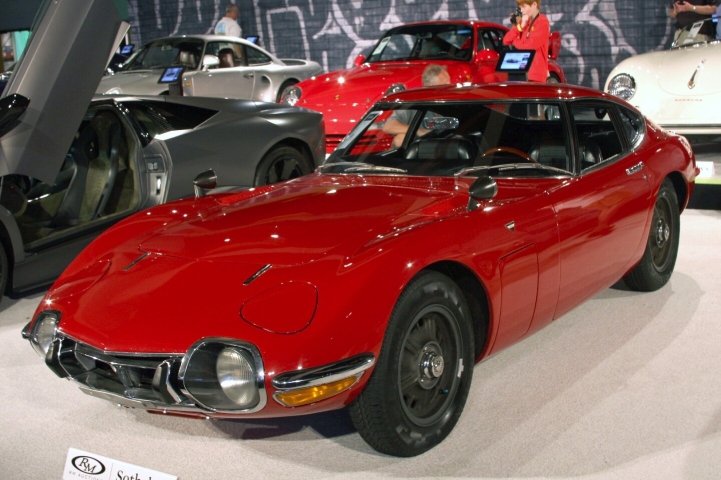 Lot 105 is a 1971 Lamborghini Miura P400 SVn which fetched $2,475,000 to set a new record for the model