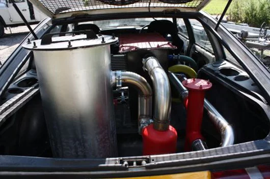 The Coffee Car team modified an old Rover SD1 to run on coffee grounds using gasification