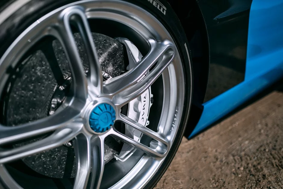 Electric blue paint looks beautiful next to polished wheels and carbon fiber brakes