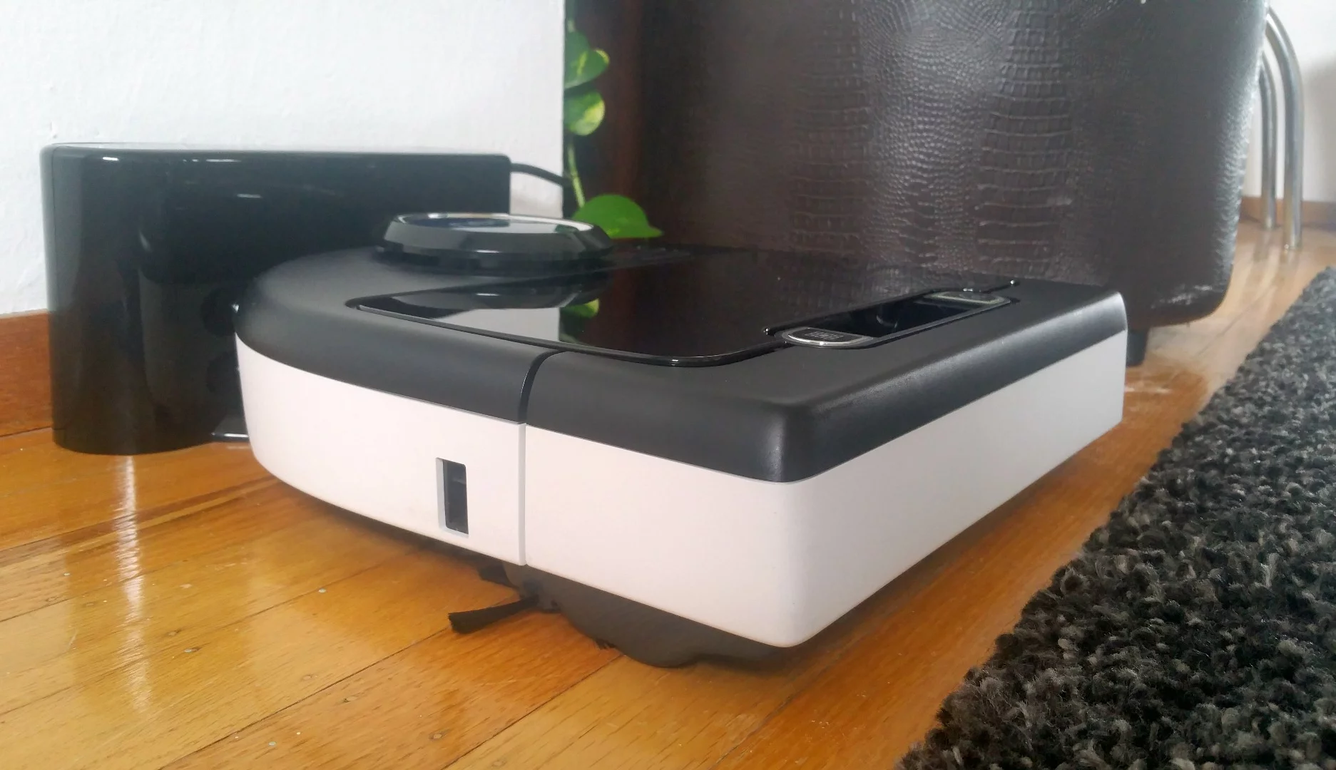 Although small, the Botvac D80's side spinner brush does well with wall and furniture edges