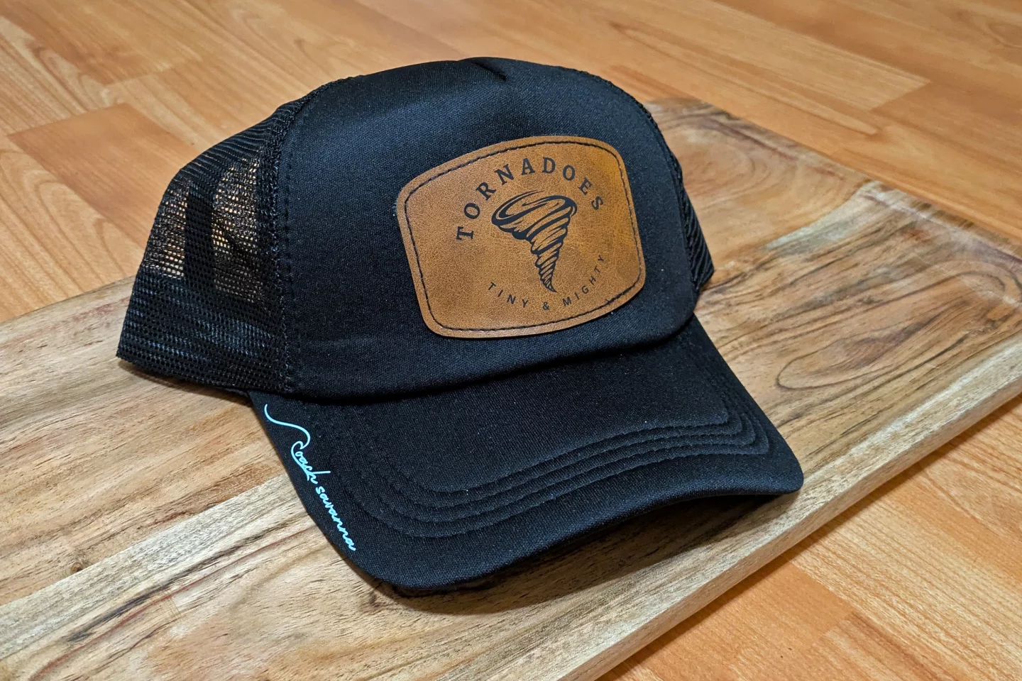 This one was tricky. I used my Omni X UV laser to engrave the leather patch, and the DTF printer to make the blue graphic, combining tools for a final product to give to a friend