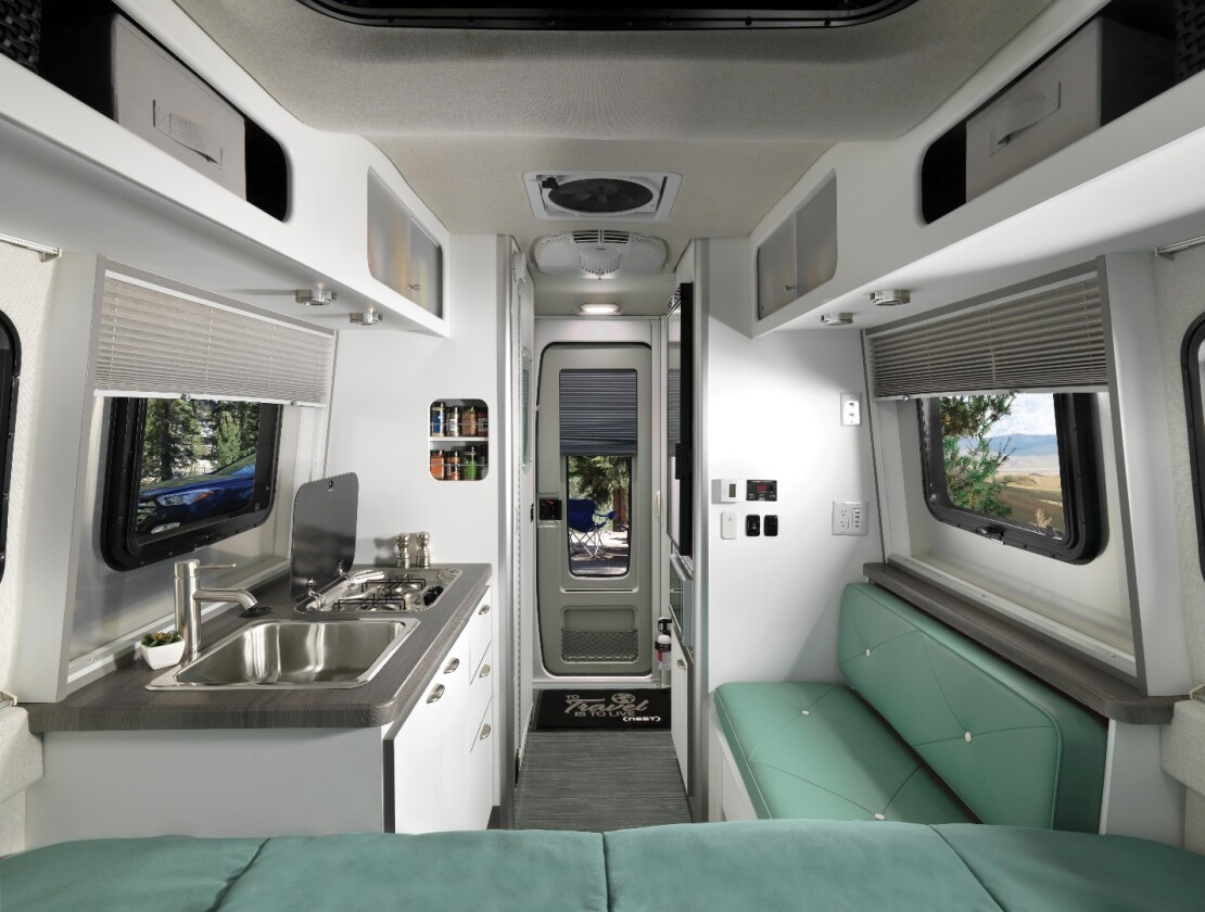The 16FB floor plan comes with a fixed rear bed and small side bench with adjustable table