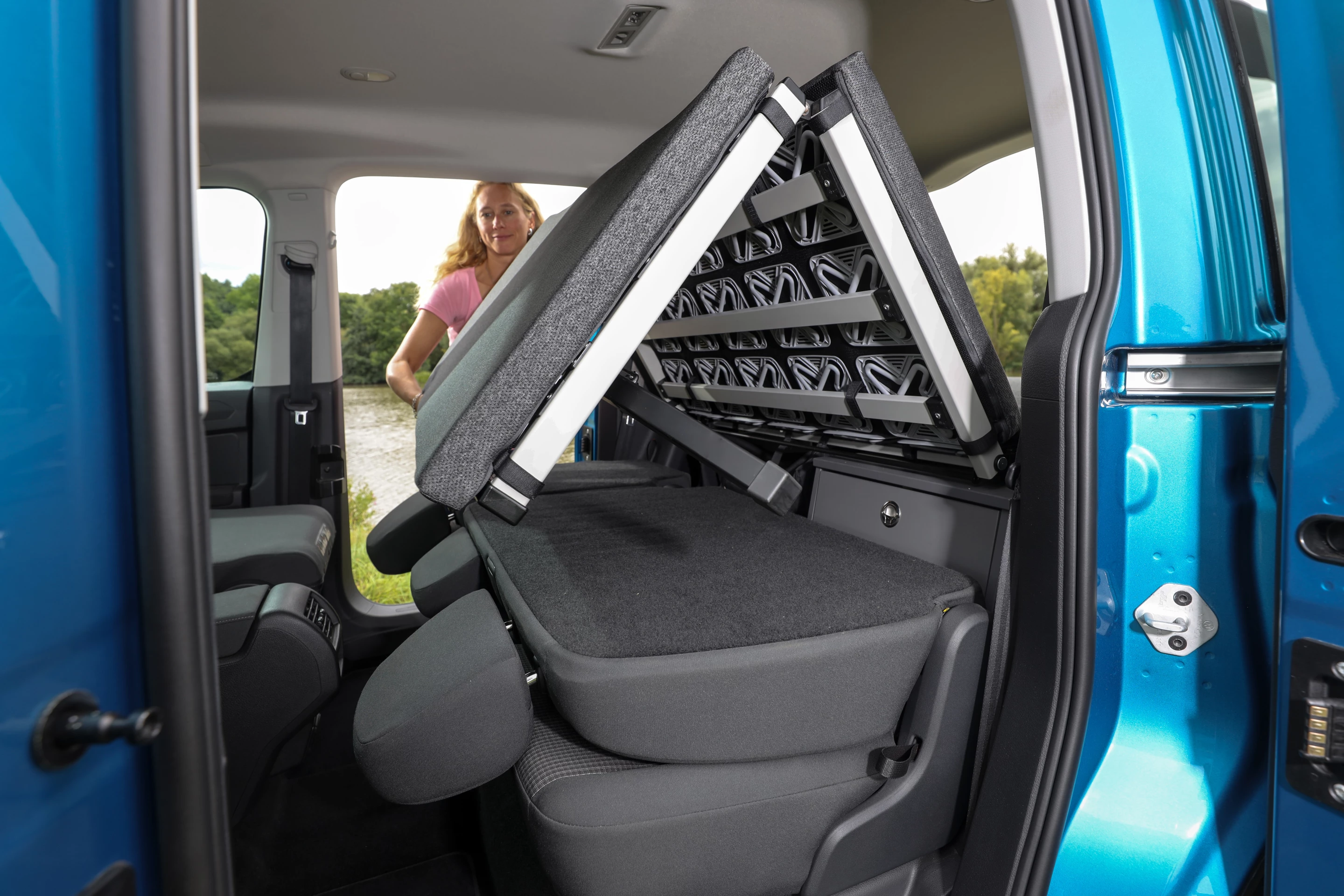 The new bed unfolds over the folded rear seats