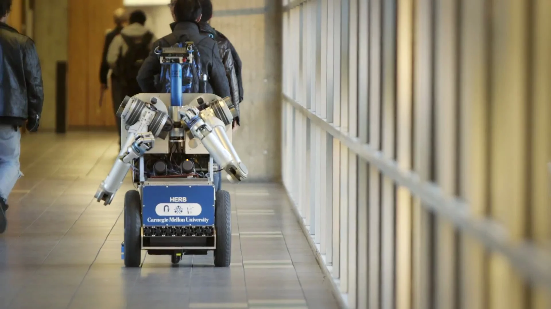 HERB turns heads as it zooms through Carnegie Mellon University's hallways