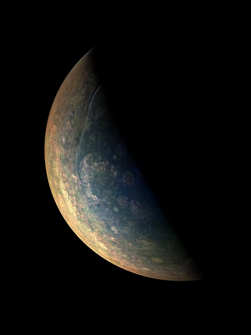This image is reconstructed from JunoCam data taken during Juno's Perijove-09. It is approximately illumination-adjusted, and enhanced by a gamma stretch to the 4th power of radiometric data