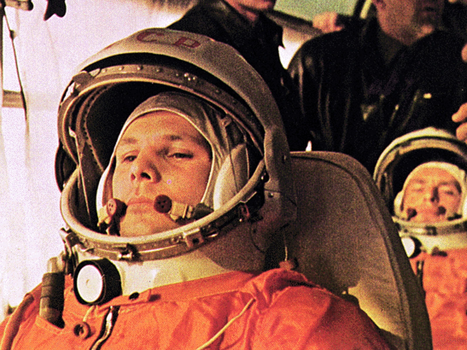 Yuri Gagarin with backup cosmonaut with Gherman Titov sitting behind him