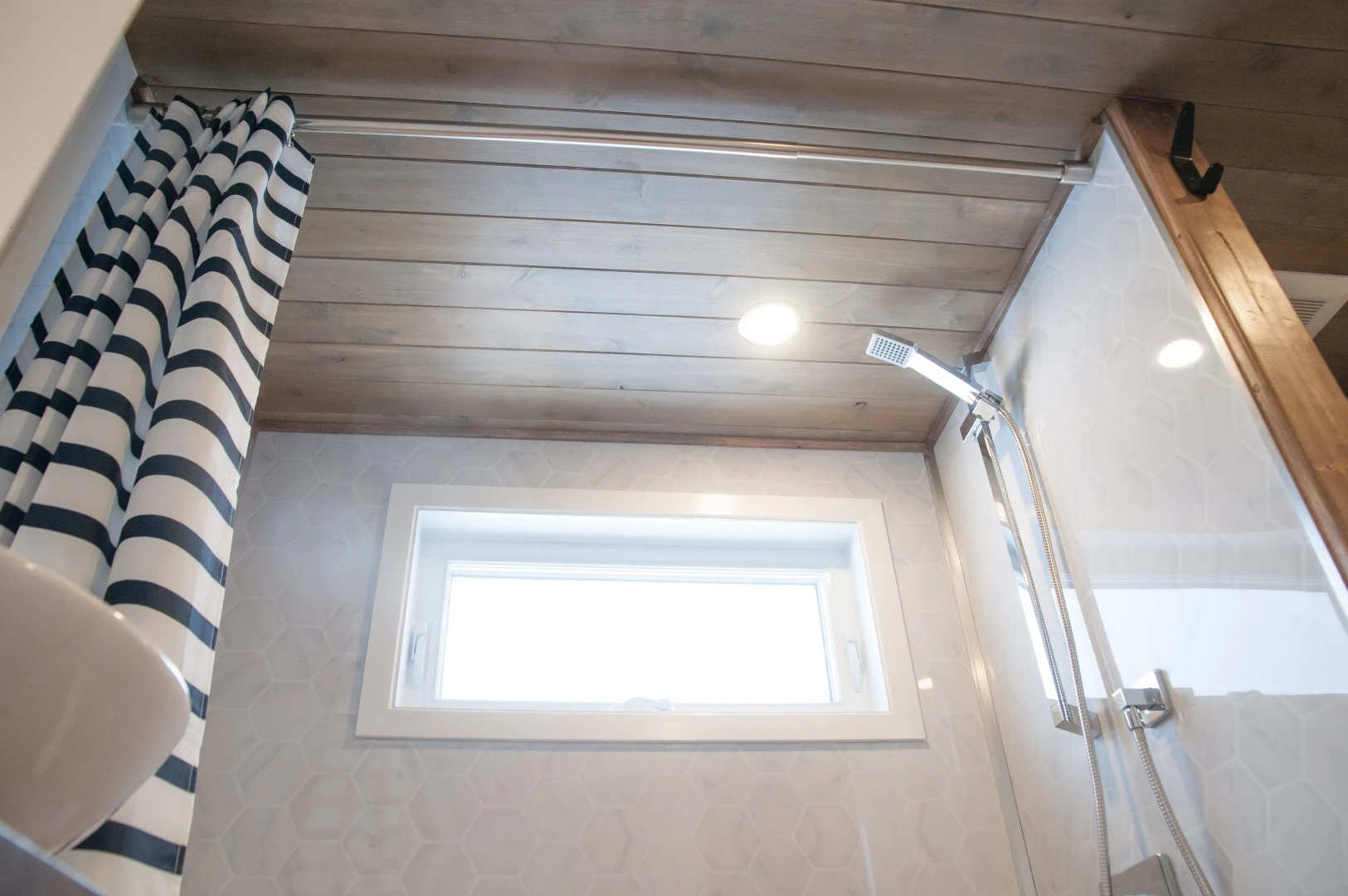 The Ébène's bathroom includes a bath/shower and composting toilet