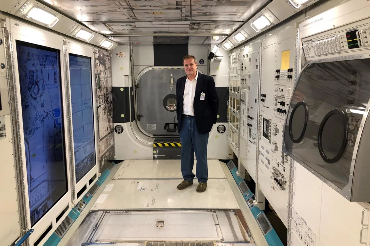 Stephan Moll, shown here at NASA, had to perform some long-distance telemedicine for an astronaut aboard the ISS
