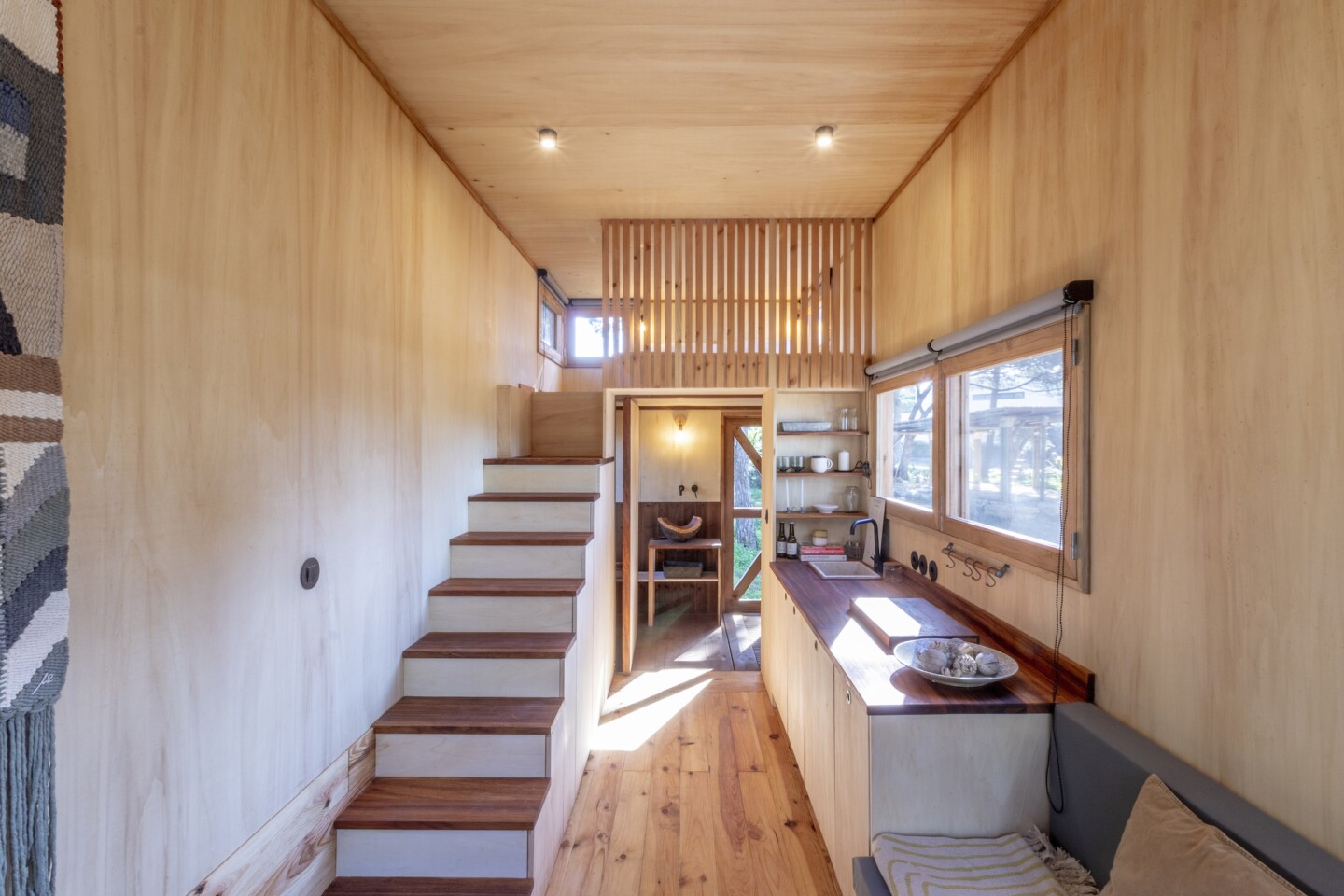 The Adraga's interior decor highlights the natural beauty of the wood