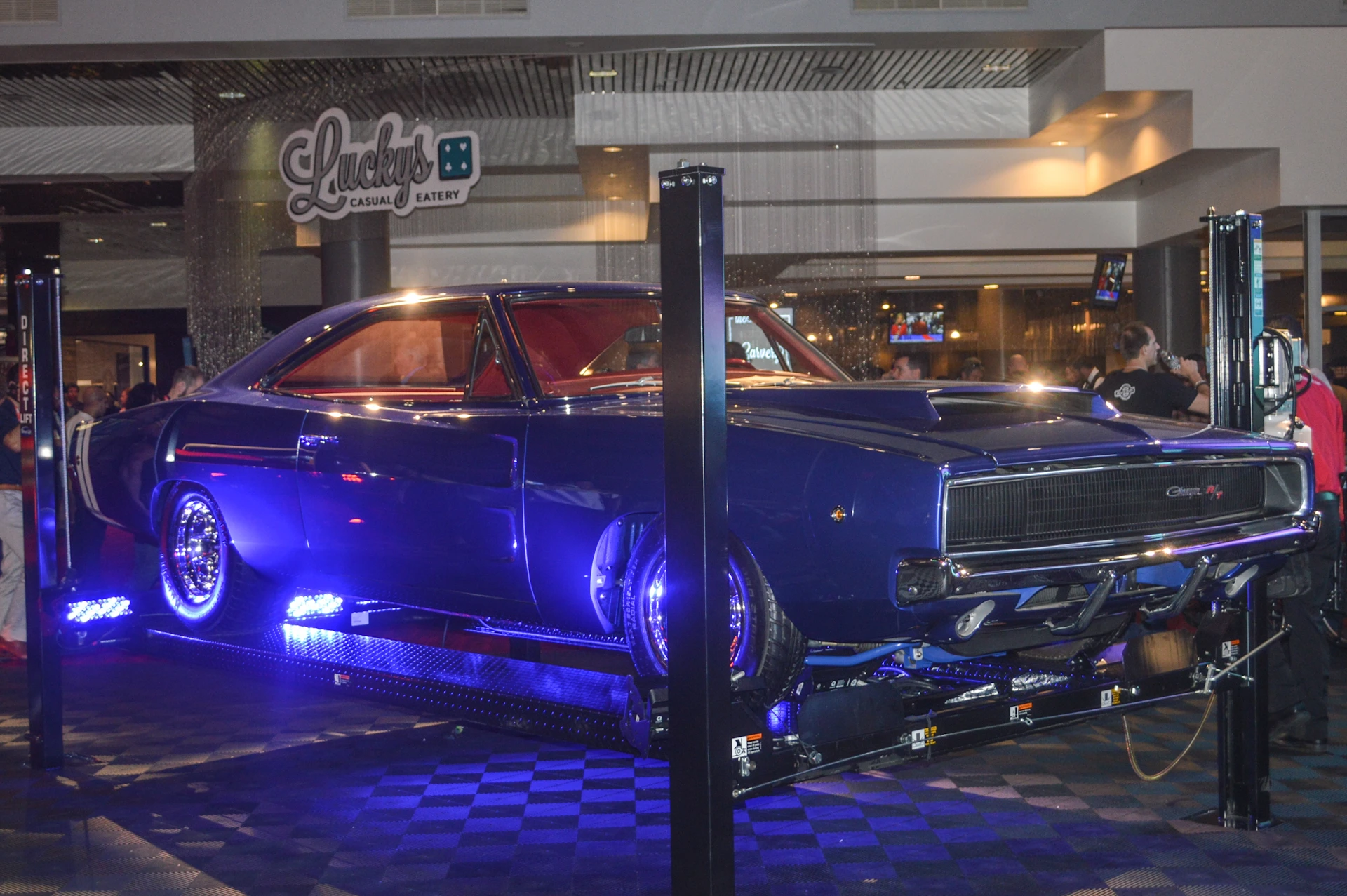 Even SEMA's hallways are packed with flashy cars (Photo: C.C. Weiss/Gizmag)