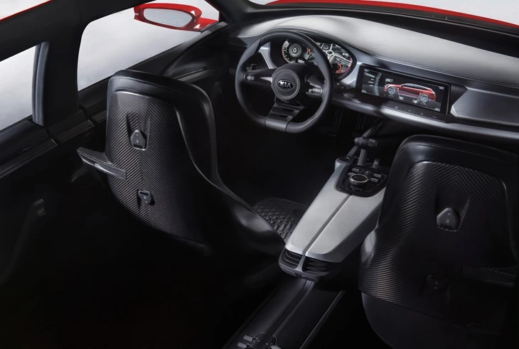 The driver section features digital gauges and an oversized infotainment widescreen display