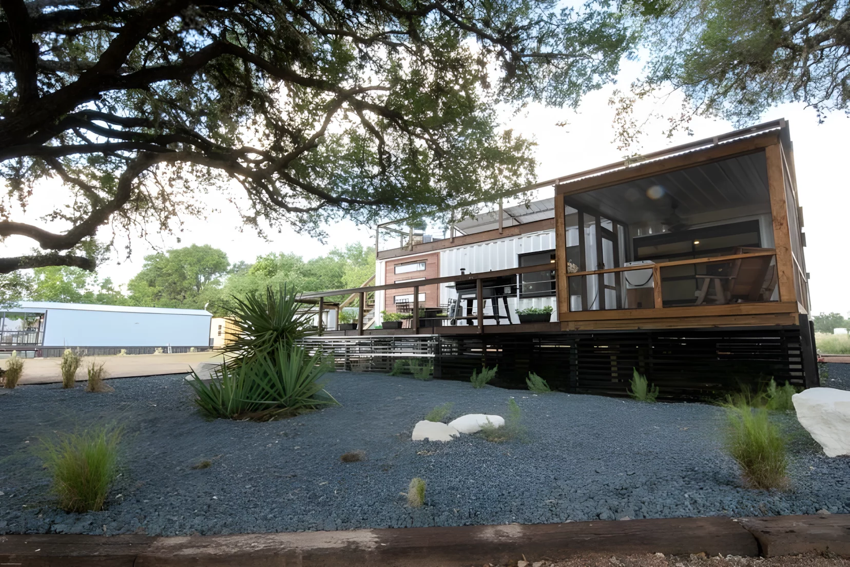 The Modern Side Stack features multiple terrace areas and porches