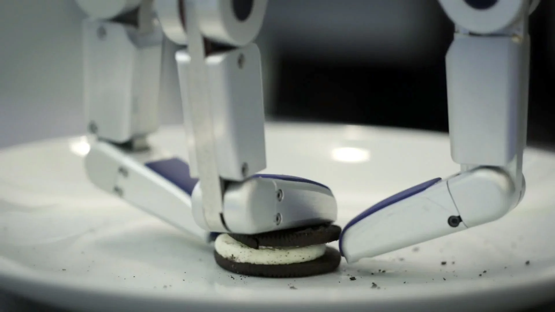 HERB has to position its hand and fingers accurately to grasp and hold the Oreo cookie