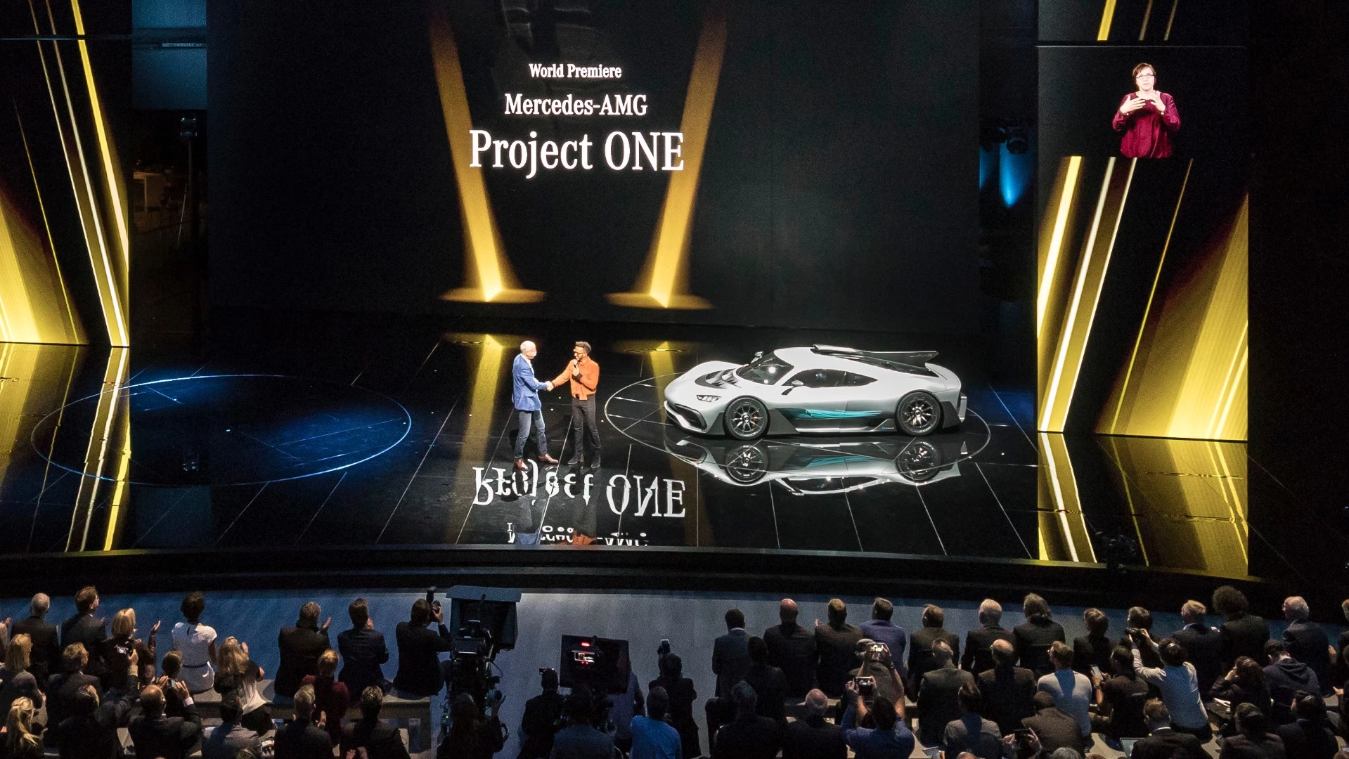 Dr. Dieter Zetsche, Chairman of Daimler AG and Head of Mercedes-Benz Cars, and the three-time world champion of the Formula 1, Lewis Hamilton, present the show car Mercedes-AMG Project ONE during the eve of the IAA.