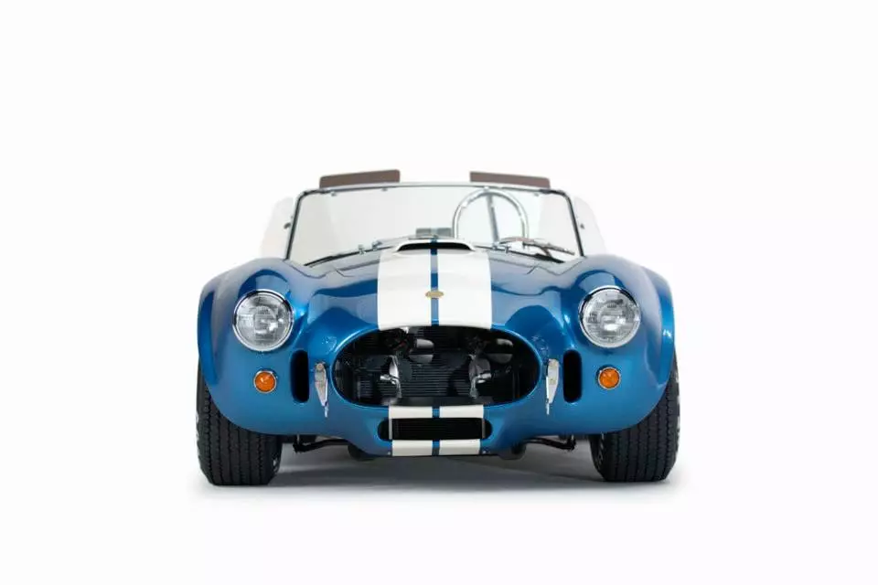 Each continuation Cobra will be painted Guardsman Blue with Wimbledon White stripes, equipped with a premium black leather interior and other special touches and the car will make it's public debut at the Barrett-Jackson Auction in Scottsdale, Arizona on January 12, 2015.