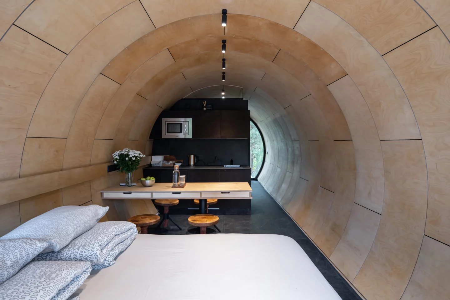 Russian Quintessential's interior walls are finished in wood, and it has a modern decor