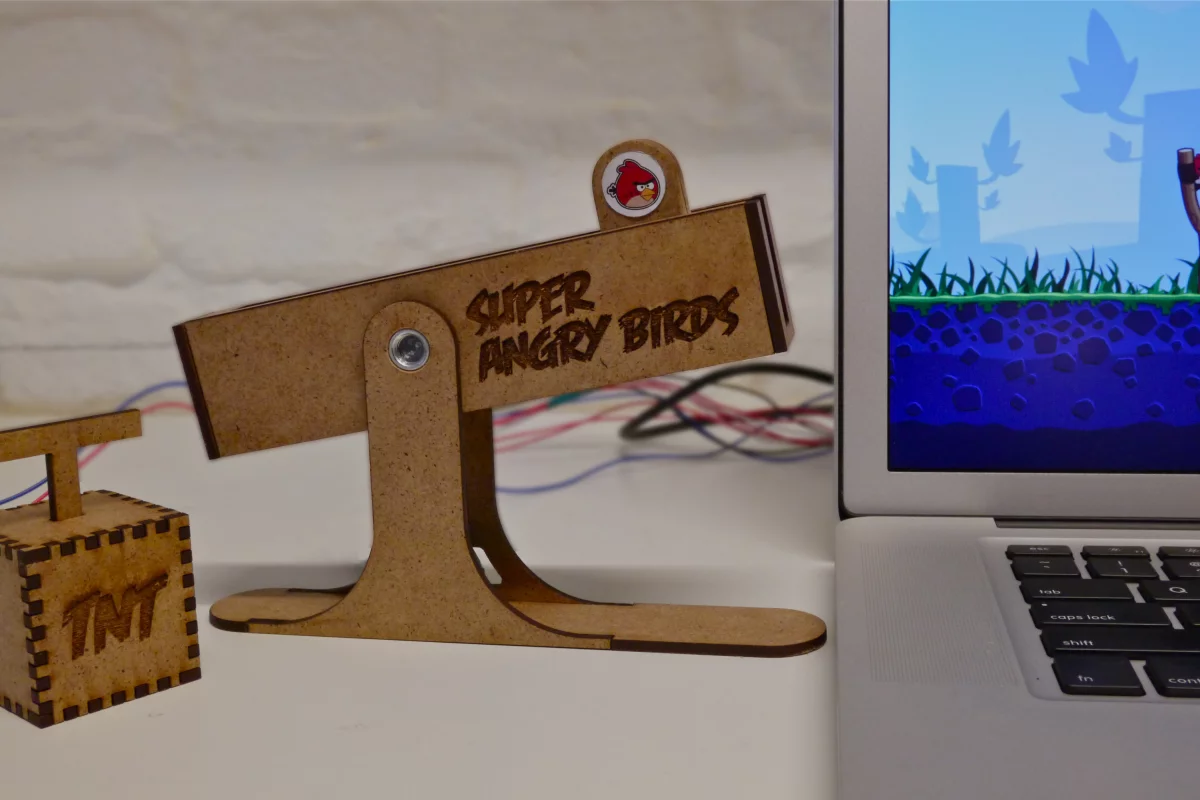 Two students designed a slingshot-style controller just for Angry Birds out of a motorized slider from a sound mixer and an Arduino microcontroller