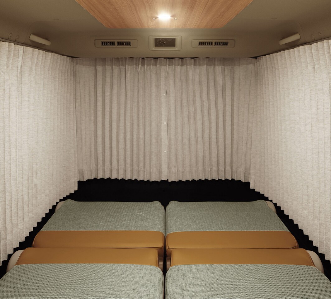A retractable wraparound curtain separates the MyRoom cabin from the van cockpit and outer world