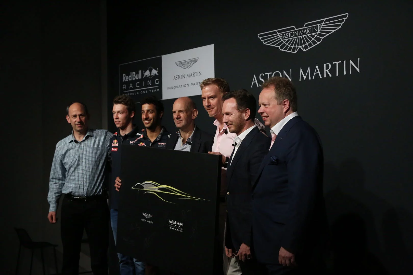The Red Bull and Aston Martin teams at the launch of the AM-RB 001