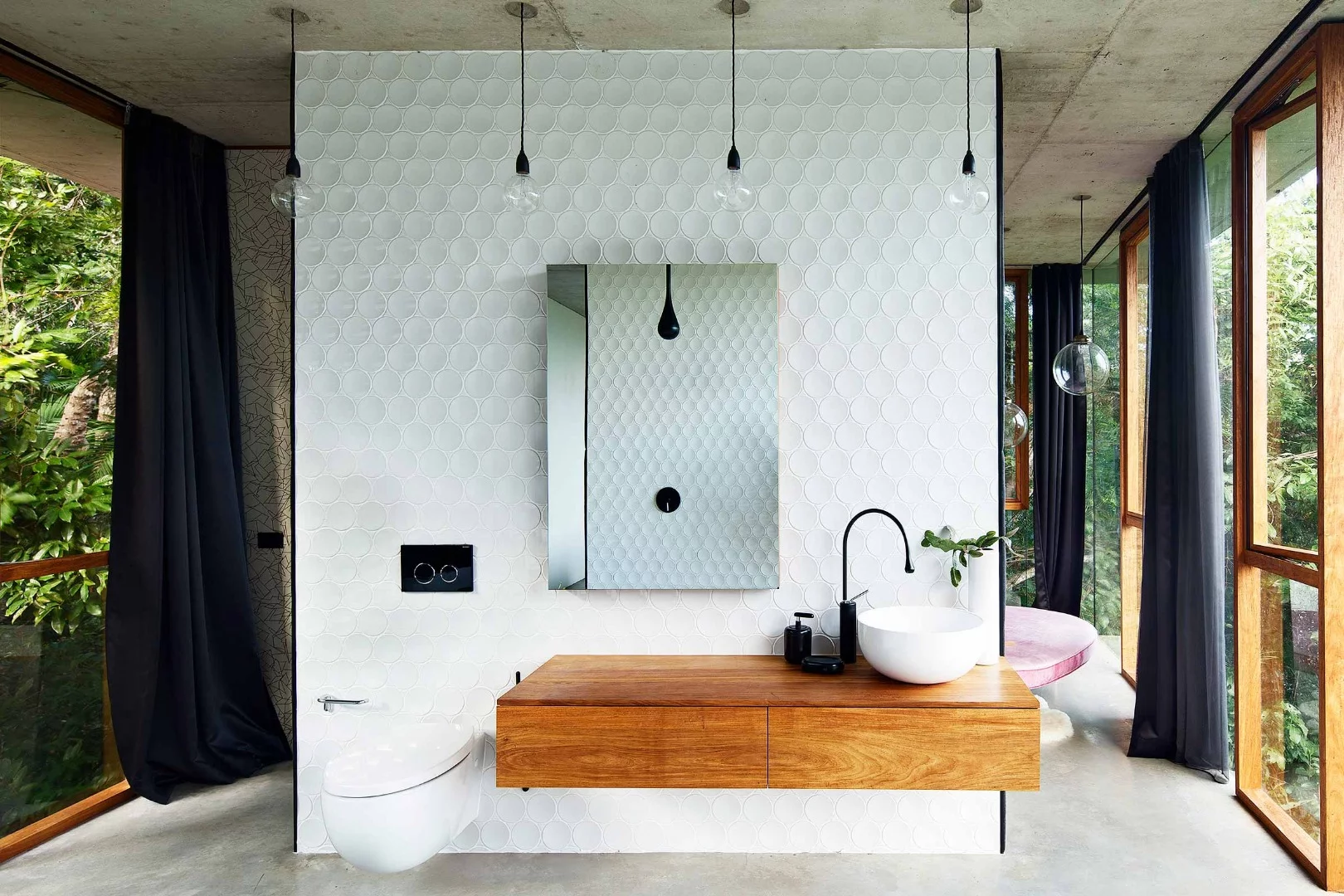 Toilet and vanity inside the Planchonella House