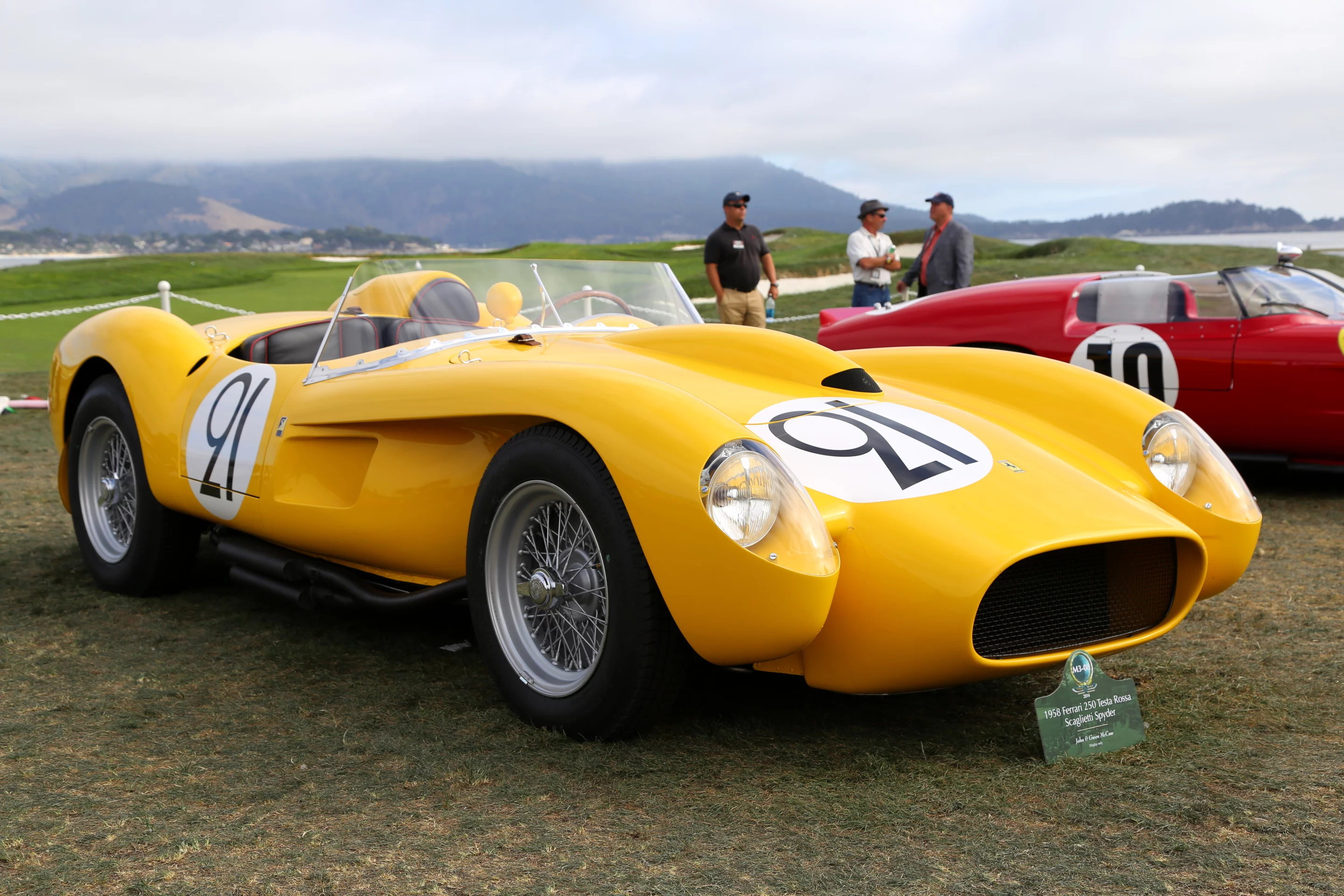 Bloody gorgeous yellow 1958 Ferrari 250 Testa Rossa Scaglietti Spyder resides amongst its own kind at the end of the fairway (Photo: Angus MacKenzie/Gizmag.com)